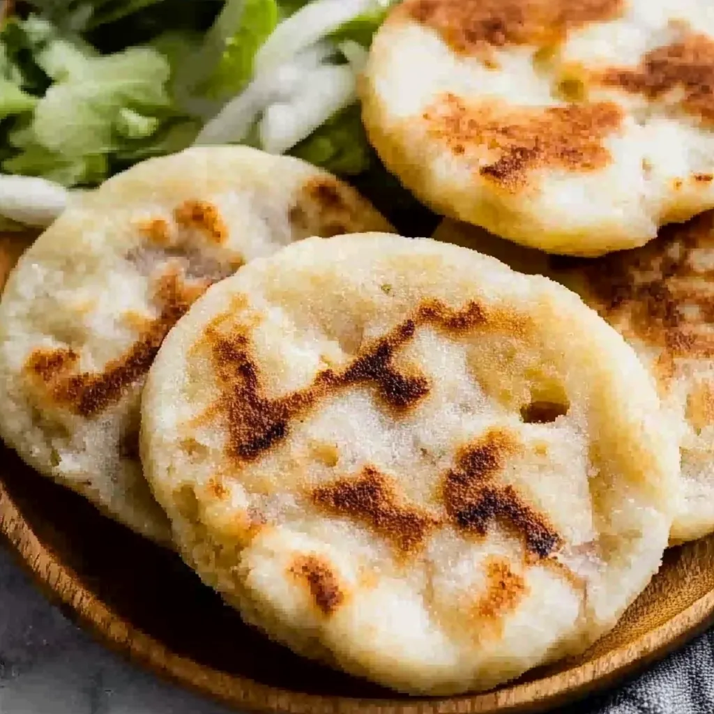 A plate of food with a tortilla on it.